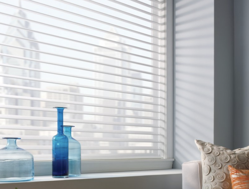 sheer fabric window curtains in a window
