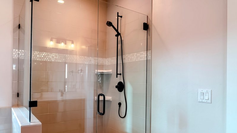 A sliding bar in a shower (Photo by Jason Finn/iStock / Getty Images Plus via Getty Images)