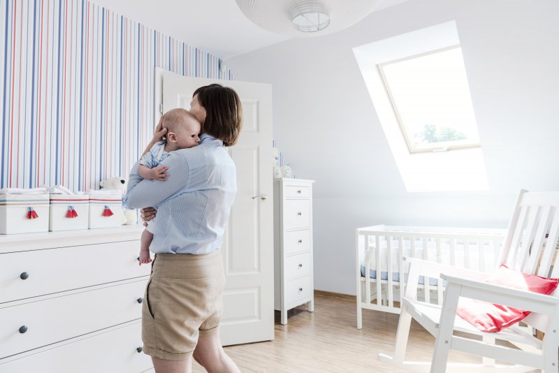 Striped accent wall in nursery (Photo by domin_domin /E+ via Getty Images)