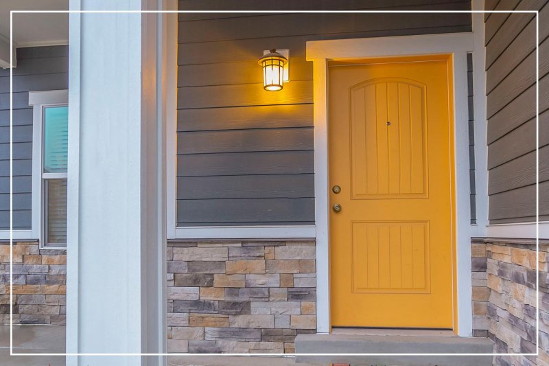 sunburst yellow front door (Photo by Jason Finn/iStock/Getty Images Plus via Getty Images)