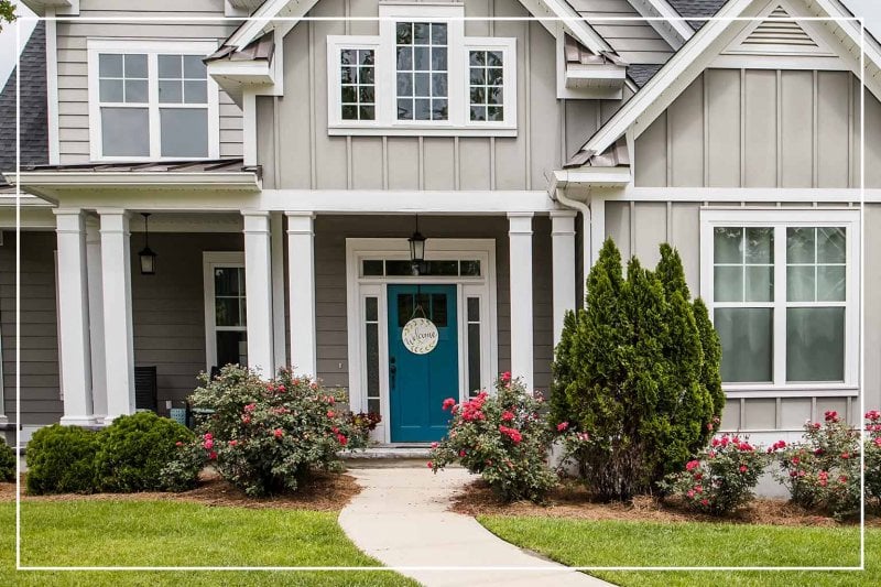 teal front door (Photo by ucpage/iStock/Getty Images Plus via Getty Images)