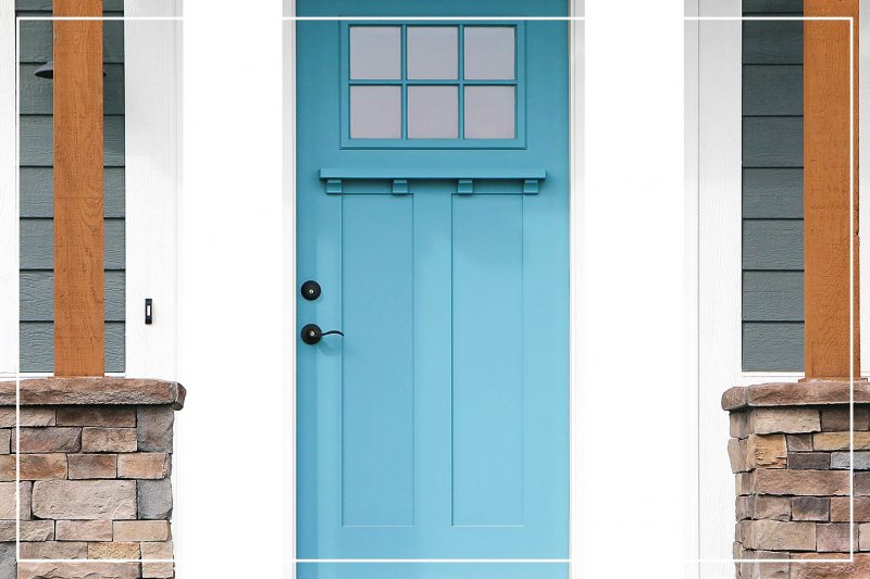 Turquoise paint color front door (Photo by TriggerPhoto/iStock/Getty Images Plus via Getty Images)
