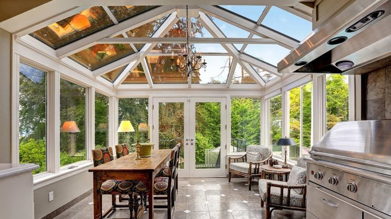 Sunroom with vaulted glass ceiling (Photo by Iriana Shiyan - stock.adobe.com)
