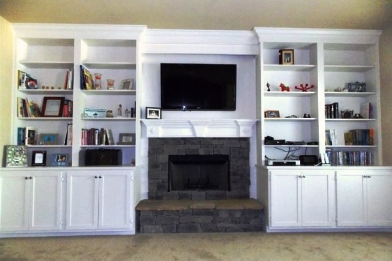 custom built-in bookshelves around living room fireplace