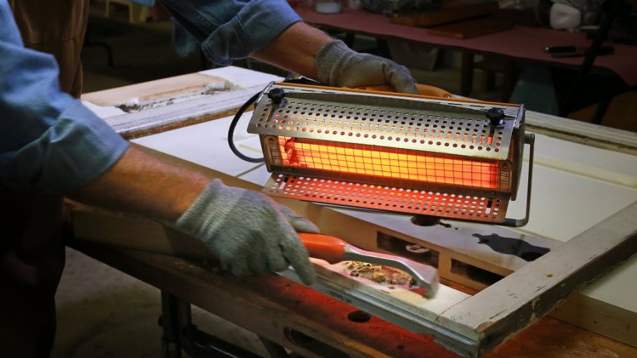 A speedheater used for paint removal on old doors at The Front Gate in Indianapolis