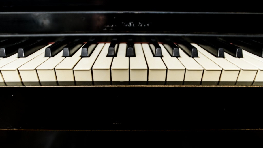 keys on a black piano