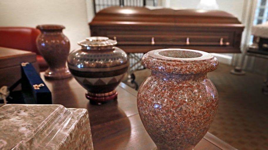 cremation urns and a casket