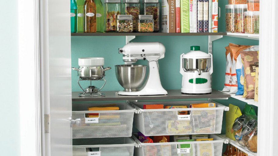 Organized kitchen pantry with baskets and shelves,