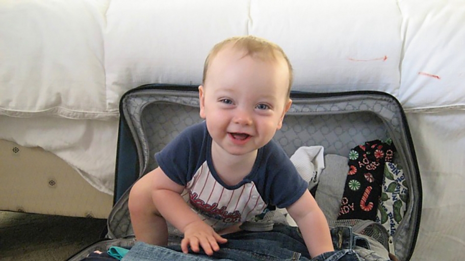 baby in suitcase