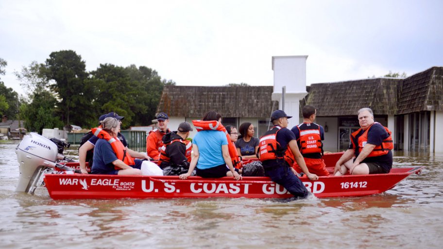 Coast Guardsmen rescue stranded residents from high water during severe flooding around Baton Rouge, La