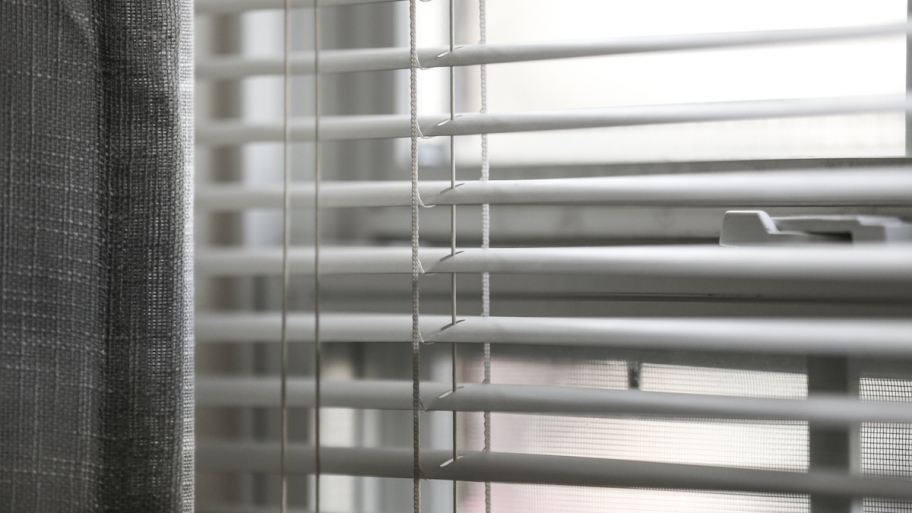 grey curtain and blinds
