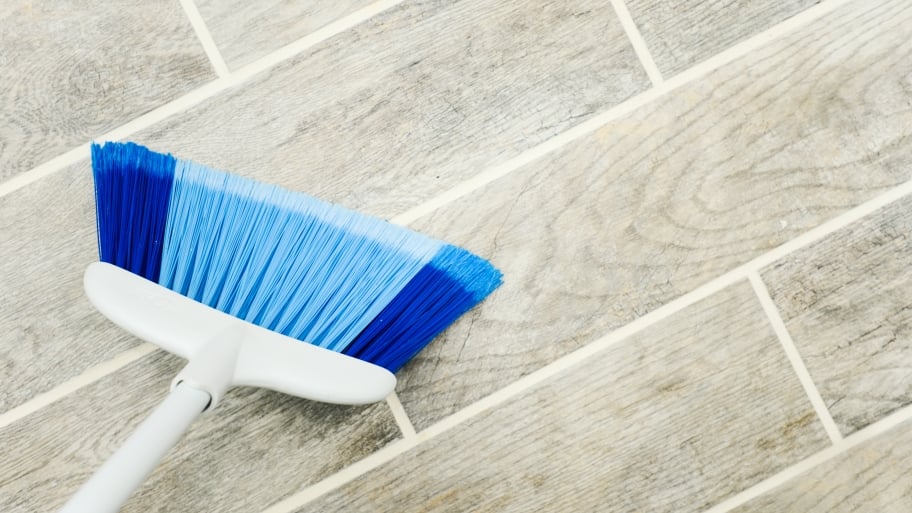 broom on wood floor
