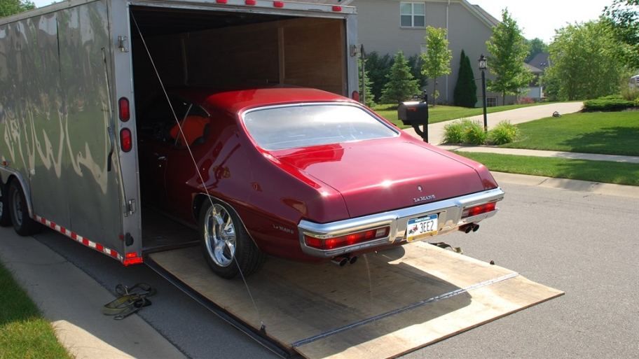 Car loaded into a trailer