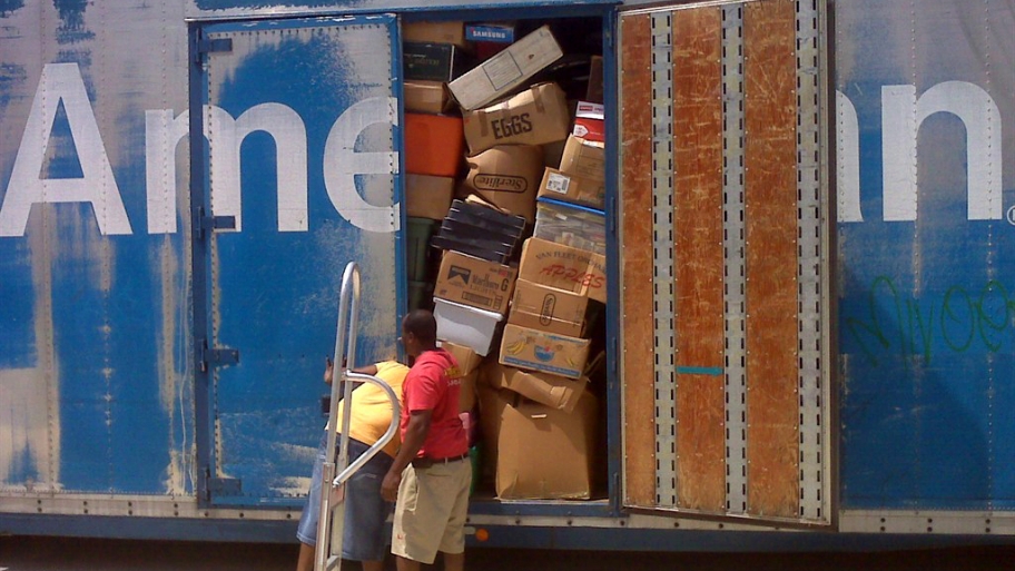 movers packing a moving truck