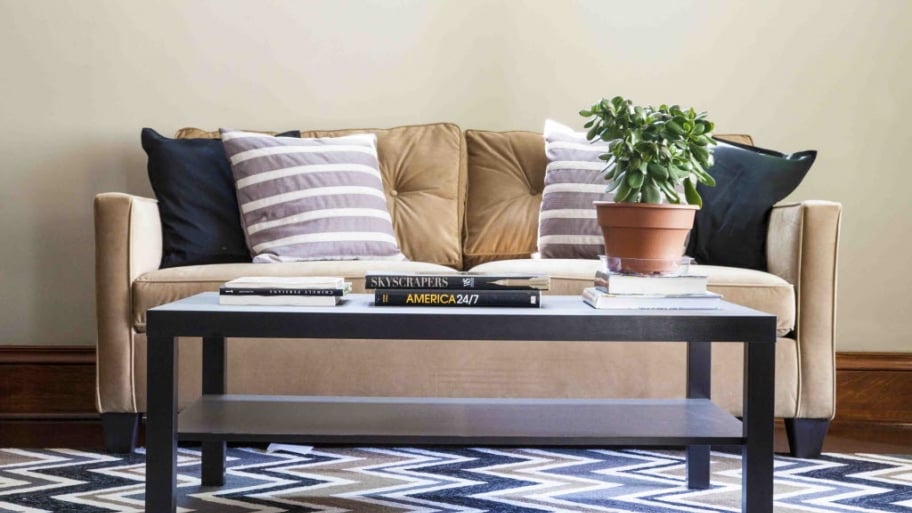 coffee table in front of brown couch