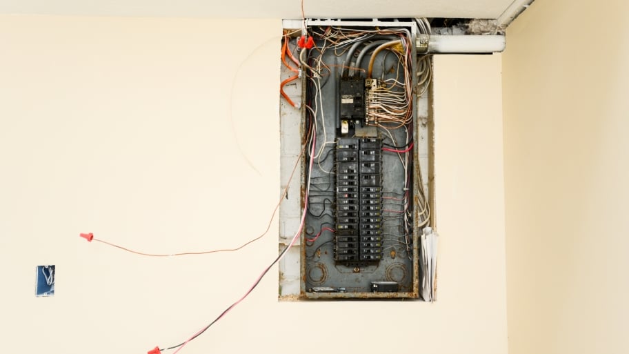 circuit breaker box with wires hanging out