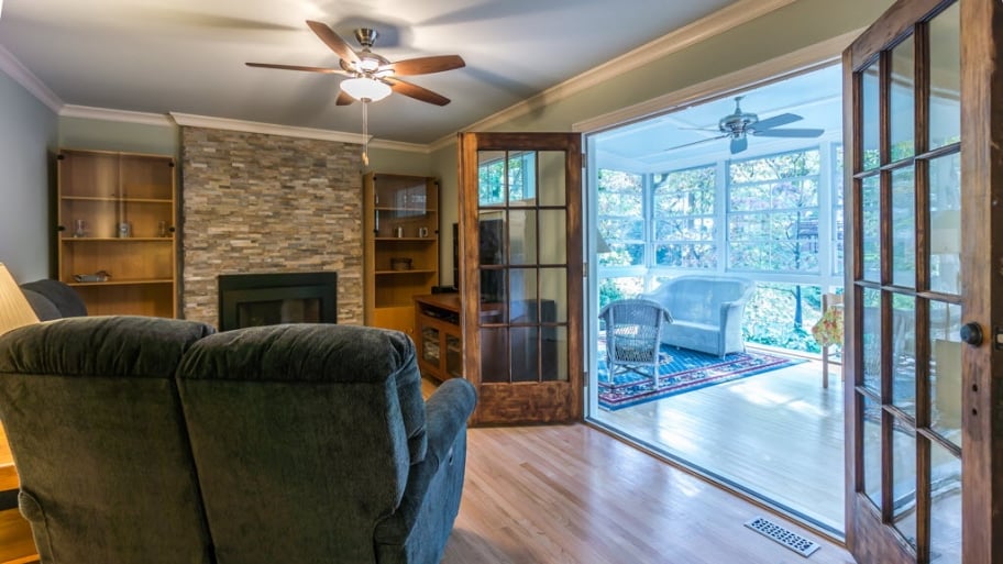 A living room and patio in green certified home