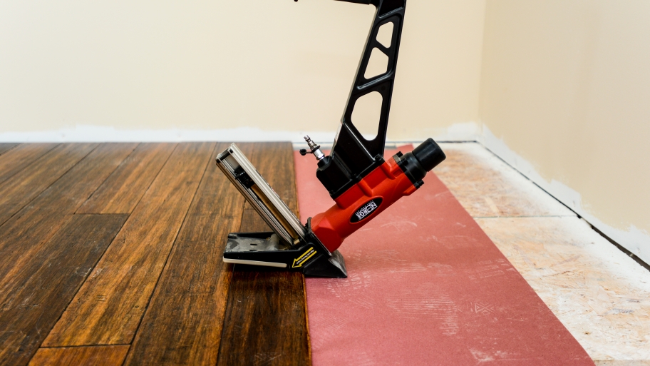 A room having hardwood flooring installed.