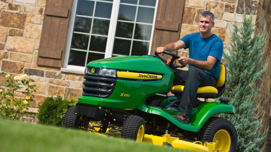 man on lawn tractor