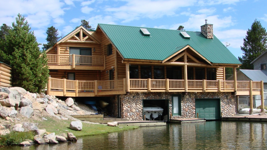 metal roof on lakeside log cabin