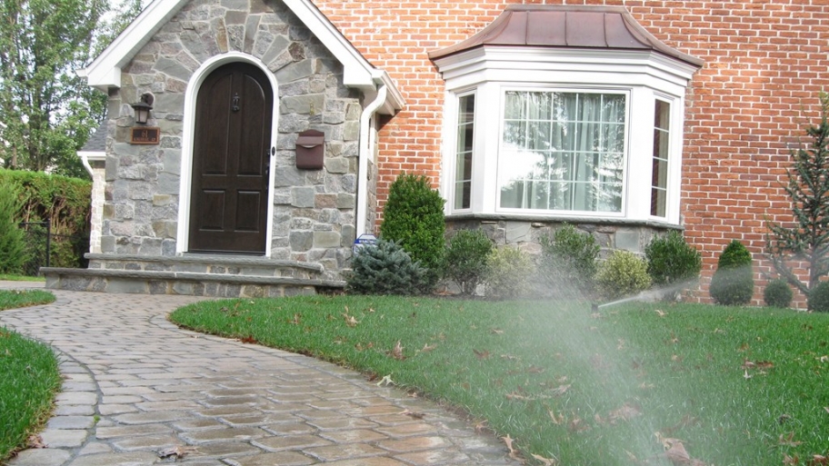 sprinkler watering lawn