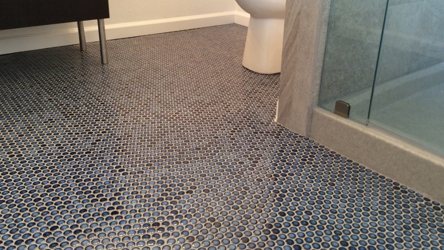 floor covered in blue penny tile