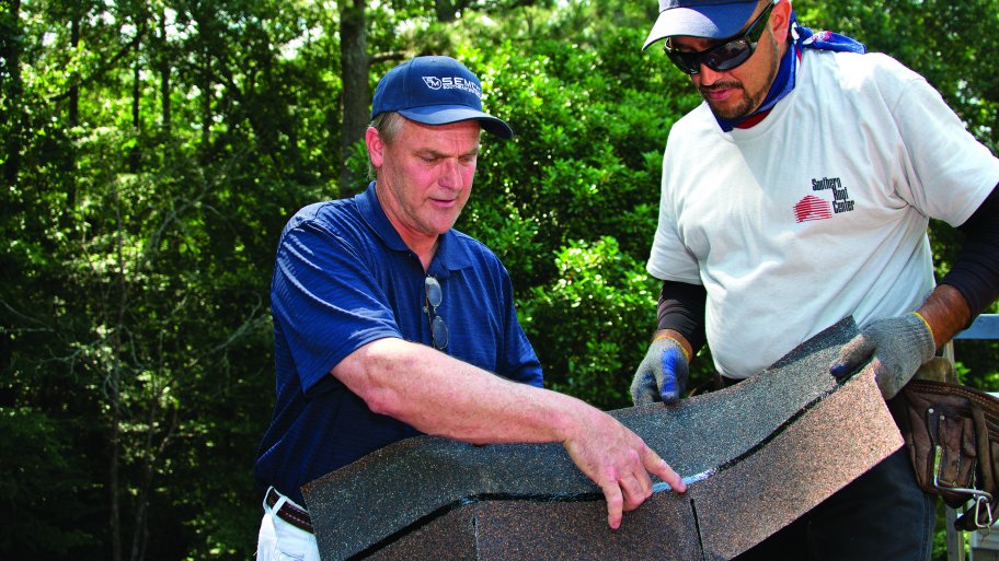 roofers discussing shingles