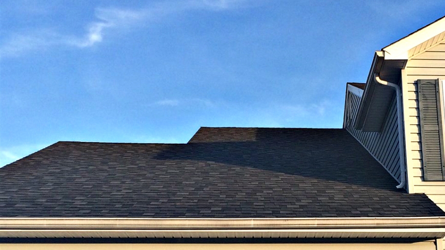 newly shingled roof on house