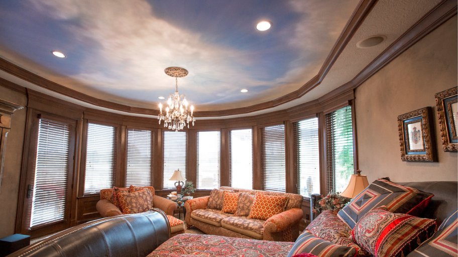 Room with ceiling sky mural by Silver Crow Studios