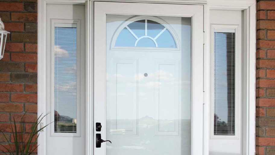 front entry door protected by a white storm door