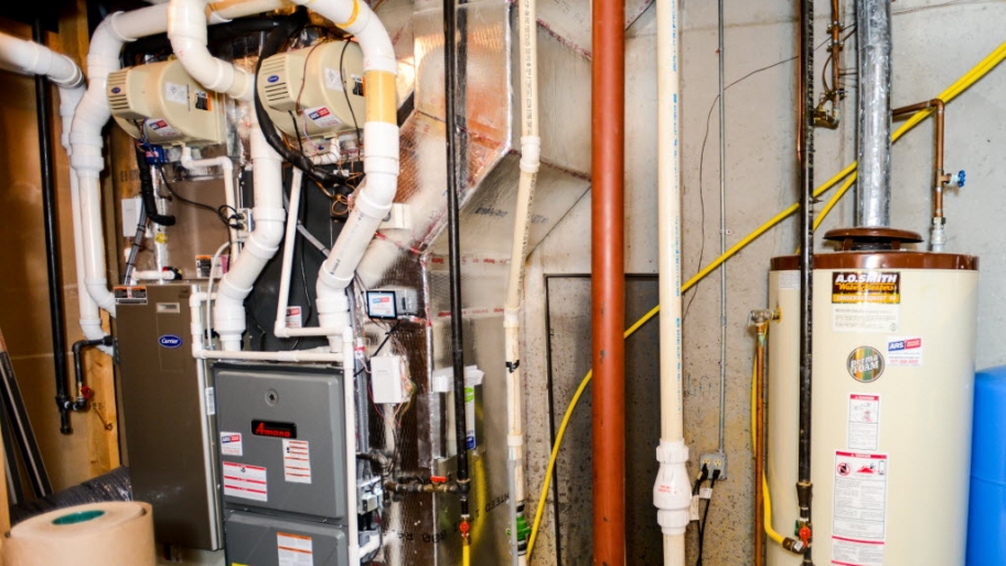 frnace and hot water heater in basement Furnace in basement