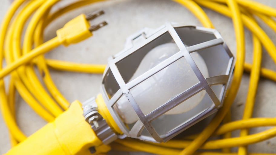 yellow utility light with bulb