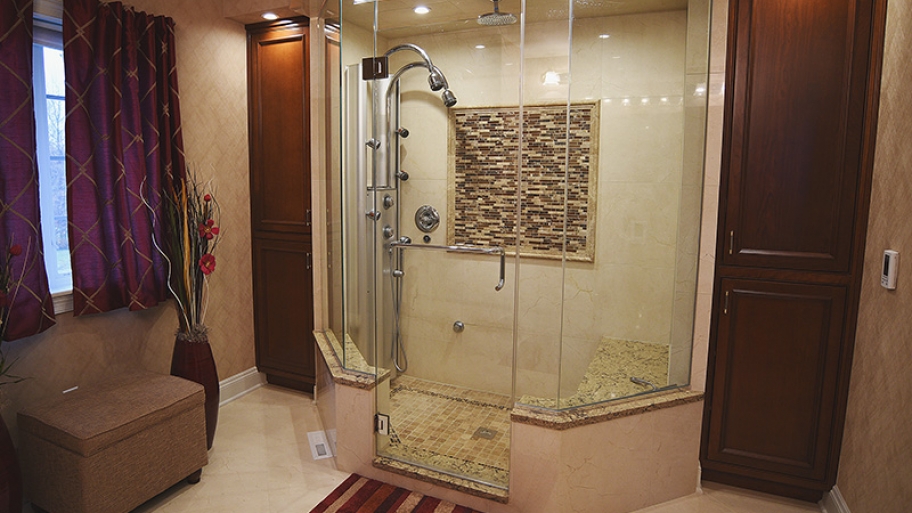 walk-in tile shower with glass door and enclosure