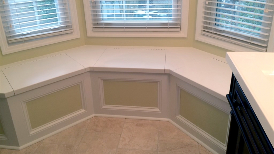 window seat under a bay window