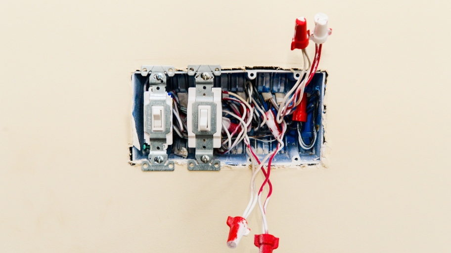 light switches in an open electrical box without cover
