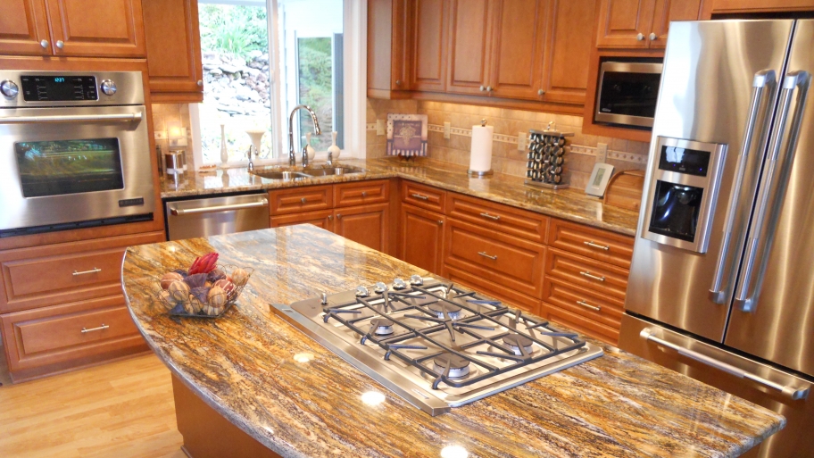 remodeled kitchen with stovetop island
