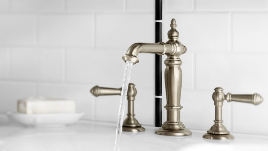 water pouring from bathroom faucet