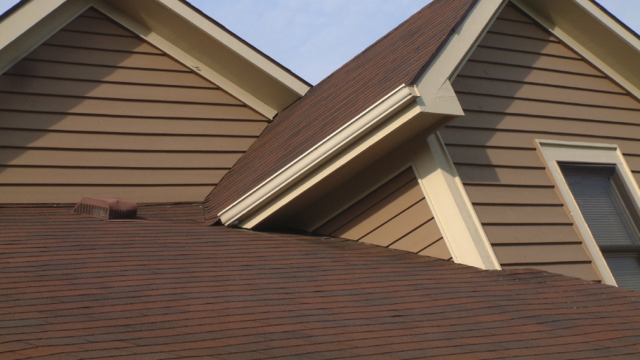 new asphalt shingle roof in red