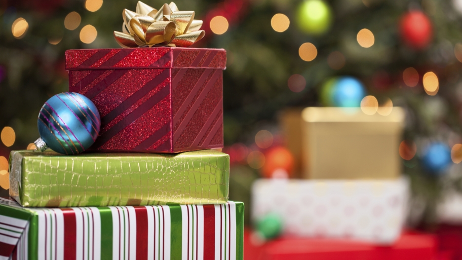 Christmas holiday wrapping paper packages presents under tree red and green