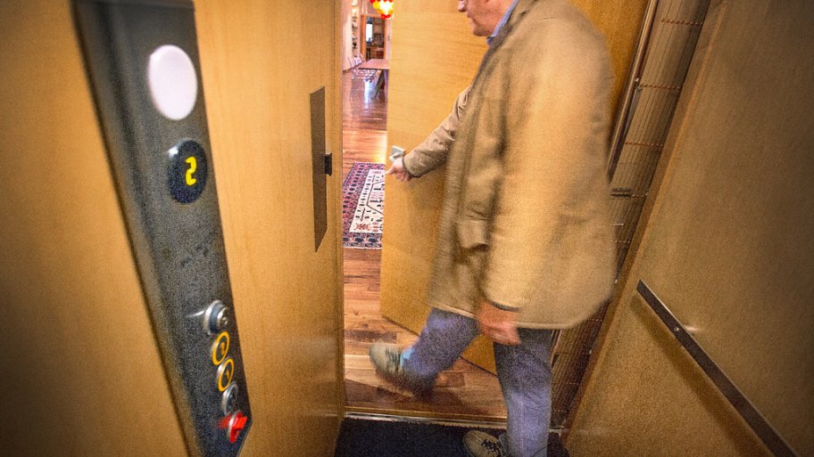 Man exiting his home elevator
