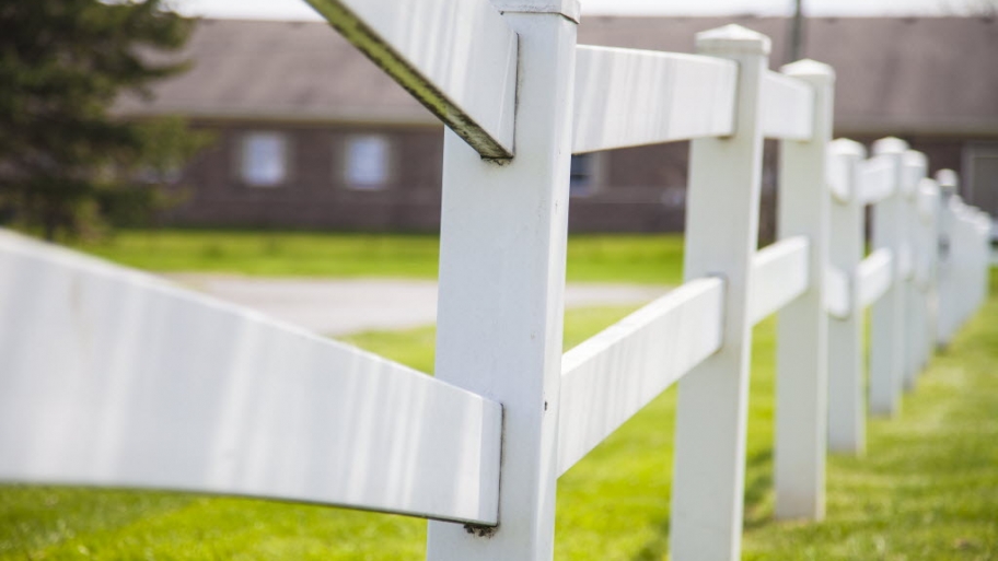Pretty wood fence and green grass