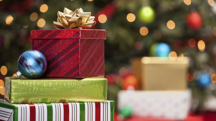 Christmas presents in front of the tree