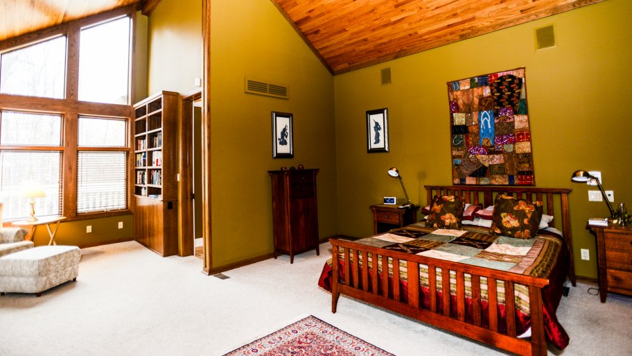 master bedroom with large windows