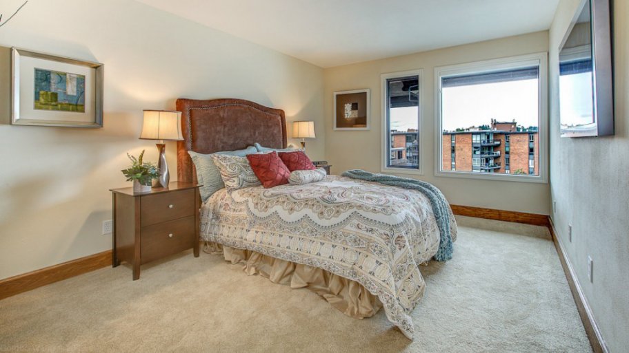 master bedroom with large windows