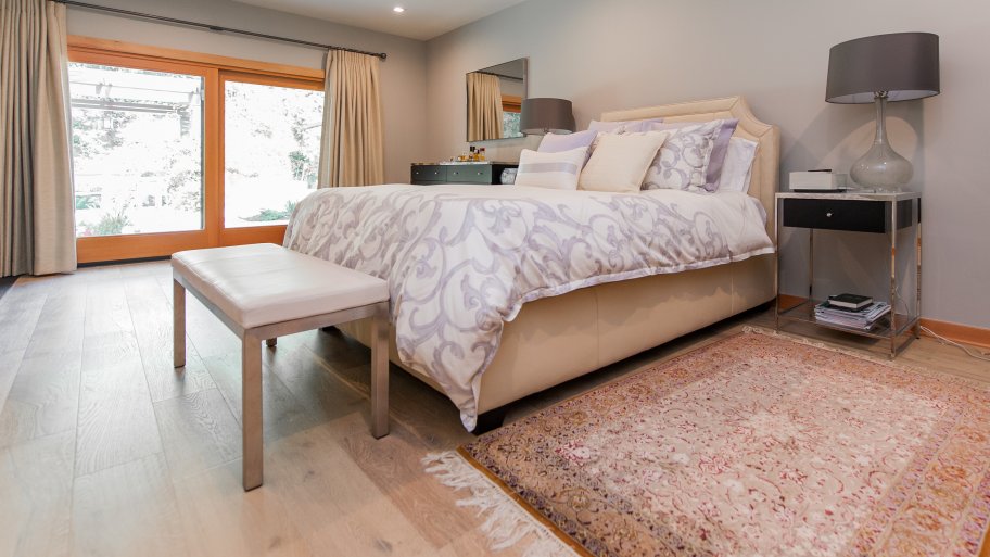 master bedroom with large windows