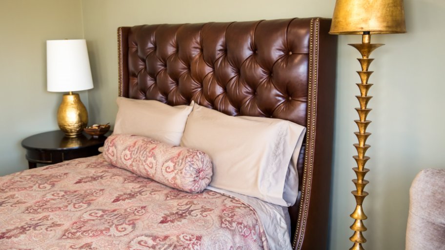 bedroom with leather headboard