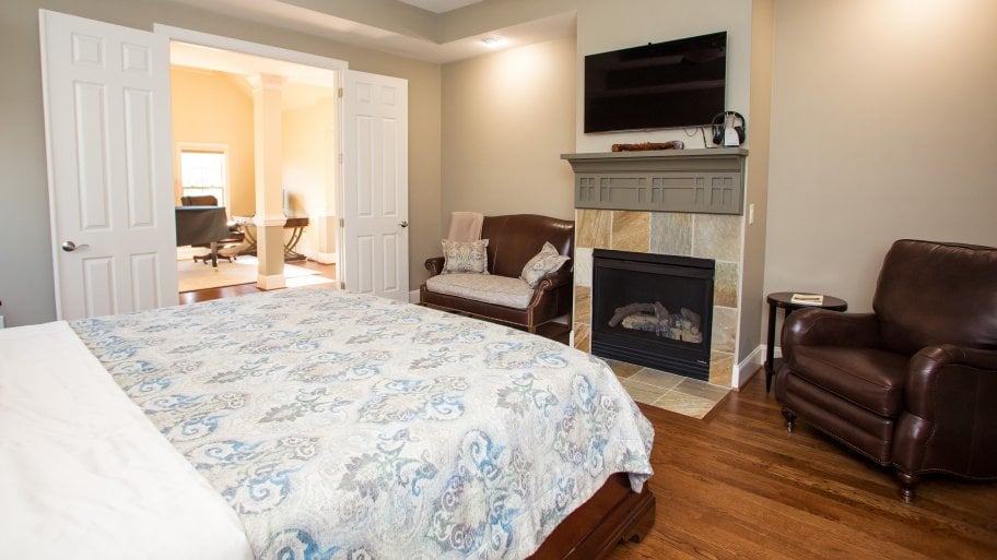 master bedroom with fireplace