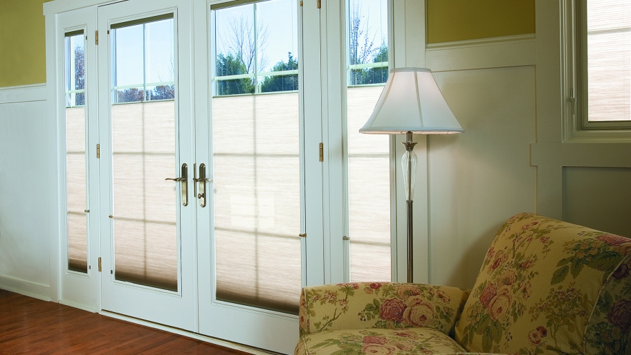 Pella Designer Series wood patio doors with folding hinges