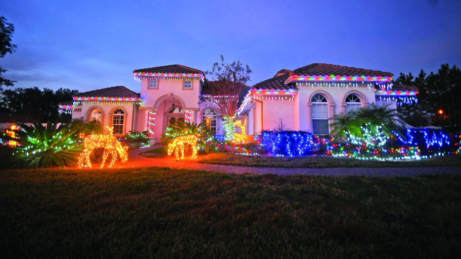Two-story home with elaborate Christmas lights