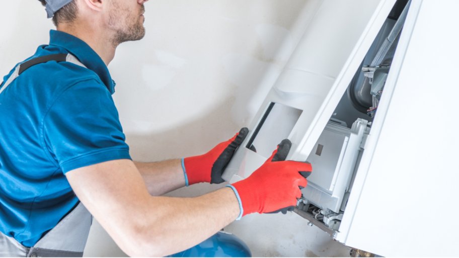 Professional checking a furnace after moving it
